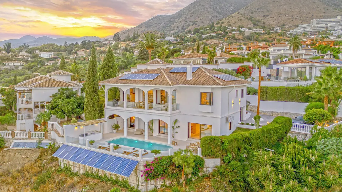 Villa Zentosa at dawn, with the Calamorro peaks behind